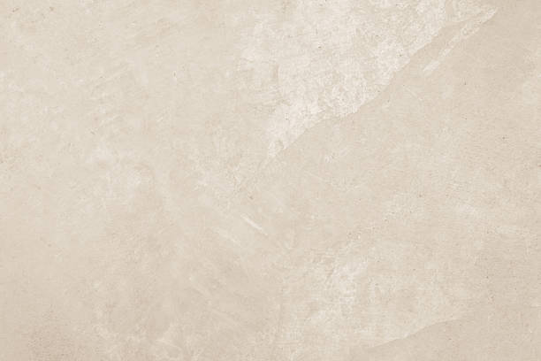 istock Colour old concrete wall texture background. Close up retro plain cream color cement wall background texture. Design paper vintage parchment element. 2213800824