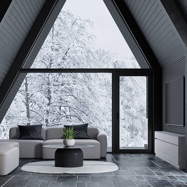 istock Modern A-Frame Mountain Cabin with Snowy Forest View 2213800980