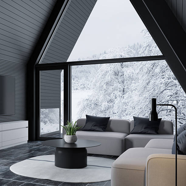 istock Modern A-Frame Mountain Cabin with Snowy Forest View 2213801007