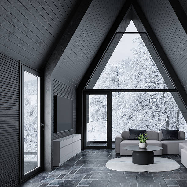 istock Modern A-Frame Mountain Cabin with Snowy Forest View 2213801066