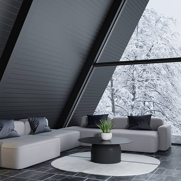istock Modern A-Frame Mountain Cabin with Snowy Forest View 2213801173