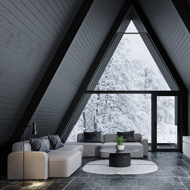 istock Modern A-Frame Mountain Cabin with Snowy Forest View 2213801221