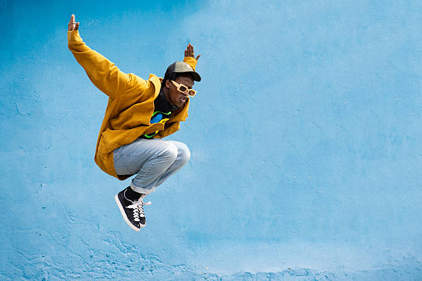 istock Body profile of Afro man jumping from high 2213802629