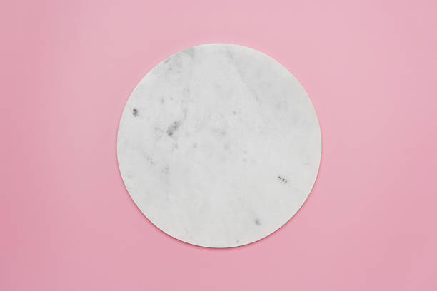 istock Round marble podium on pink background 2213809634