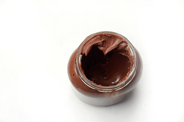 istock chocolate spread jar seen from above, isolated on white background 2213814915