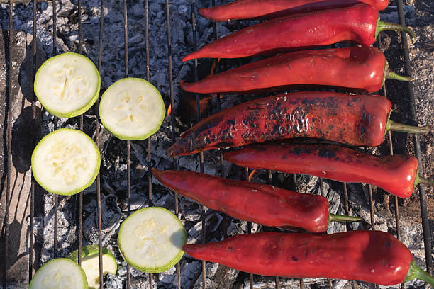 Grilled Red Peppers and Zucchini on Open Flame.