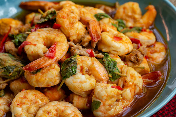 stir fried shrimp with basil leaves hot and spicy food thai style