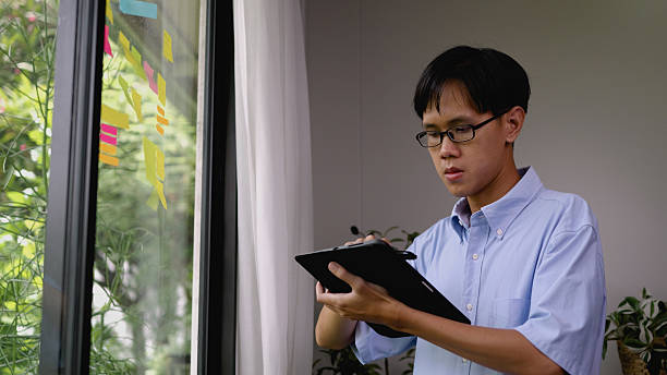 istock Creative Marketing Timeline Planning with Post-it Notes by Asian Entrepreneur. 4k 2213823738