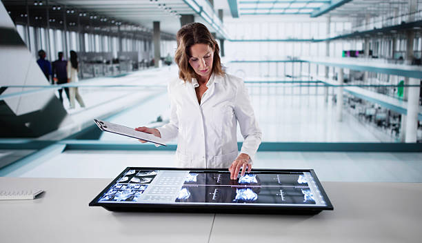 istock Female Radiologist Uses Computer To View MRI Scans 2213824668