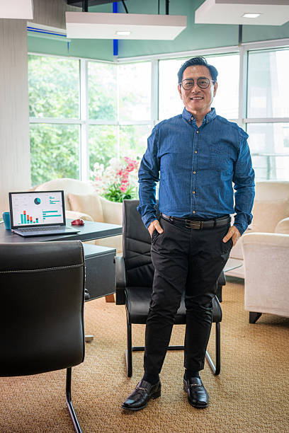 istock Portrait of Success: A Mature Professional in a Modern Workplace 2213825398
