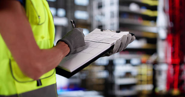 Agency Engineer Inspects Construction Site For OSHA Safety Compliance