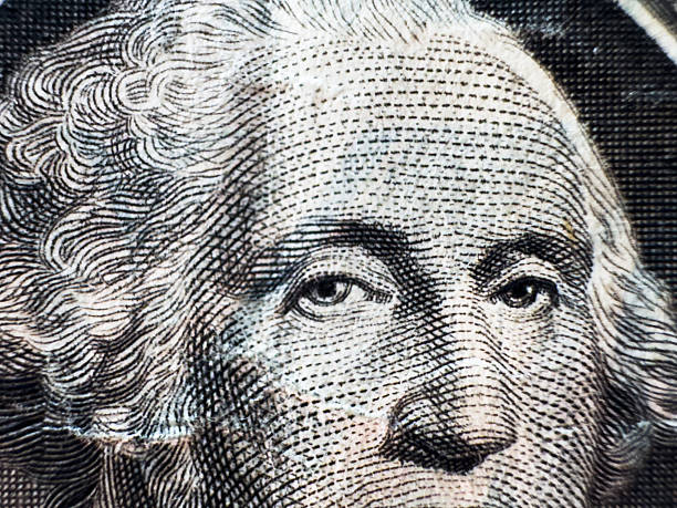 istock George Washington's eyes macro on dollar bill very close up in gray 2213829994
