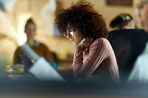 istock Thoughtful female freelancer working on laptop in the office. 2213831161