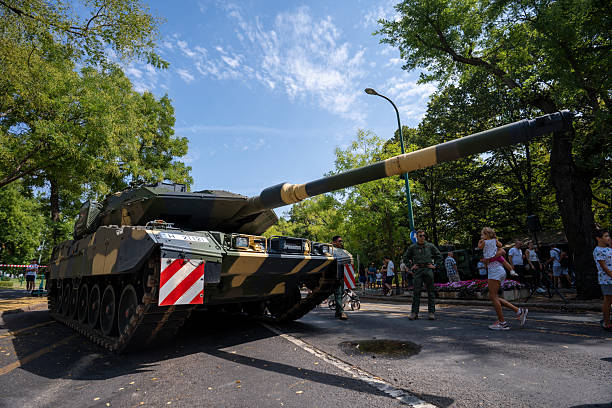 A military tank with a crew on the street in the city center, Austria, Vienna, October 26, 2025