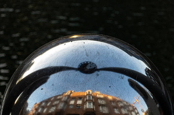 istock Abstract reflections on metal sphere with scratches 2213835084