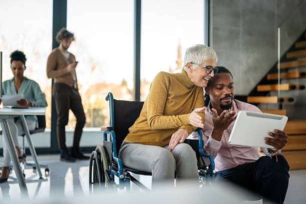 istock A bright, contemporary office space with a diverse group of professionals working together. 2213835715