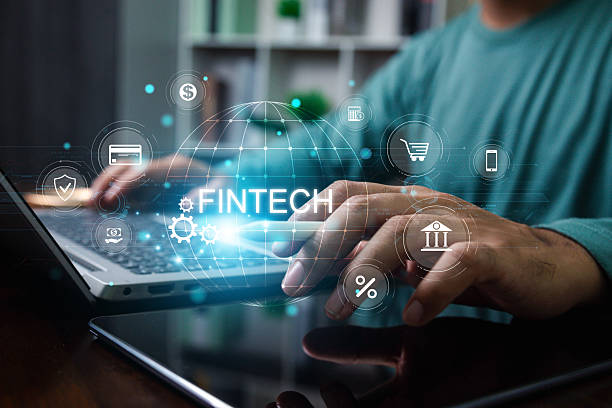 istock Digital Banking and Financial Technology Concept. FinTech, Financial technology, Digital banking, AI, Online banking and digital money.  Businessman touching virtual FinTech bank on network 2213836162