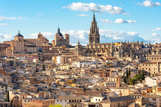 istock Toledo Cathedral above old town roofs, Spain 2213836467