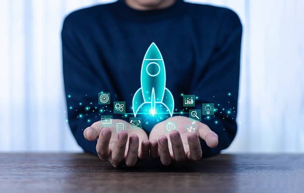 istock Businessman touching transparent rocket icon launching. Startup concept, rocket, growth, company, idea, success, digital, technology, marketing, finance, innovation, project, design, creativity. 2213839964