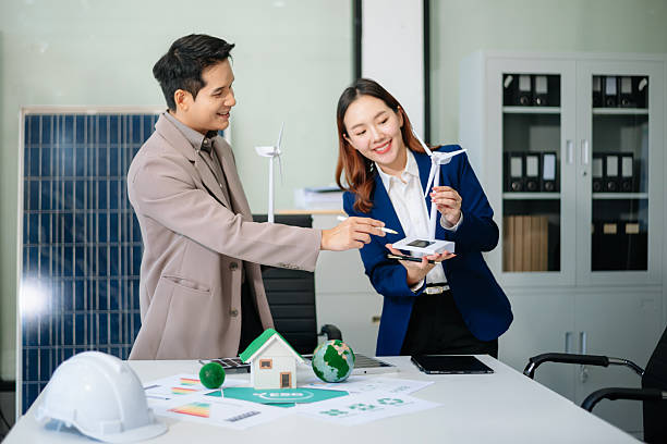istock Engineer Team Meeting of Sustainable Energy Project, solar panel project, power innovation on a solar and wind energy project 2213842809