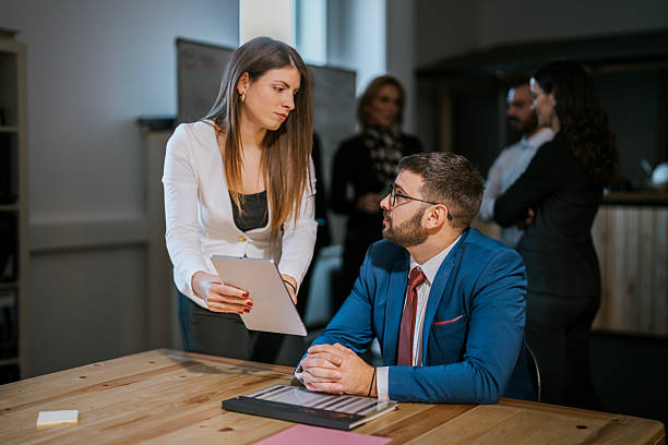 istock Professional coworkers collaborating together in a modern office workspace environment 2213844939