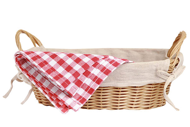 istock Wicker basket with kitchen red checkered towel isolated on white background 2213845161