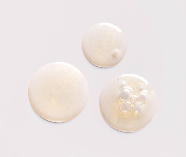 istock round drops gel serum on a light background 2213845231