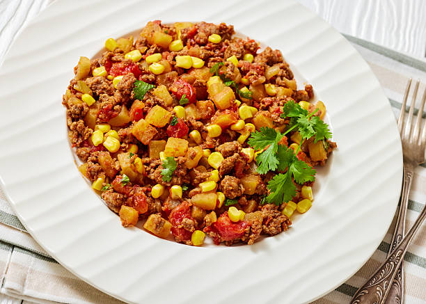 istock ground beef stew of potatoes and chopped tomatoes 2213846022