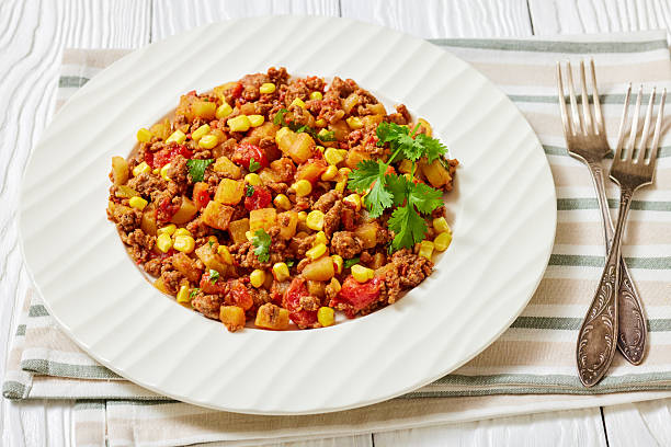istock ground beef stew of potatoes and chopped tomatoes 2213846037