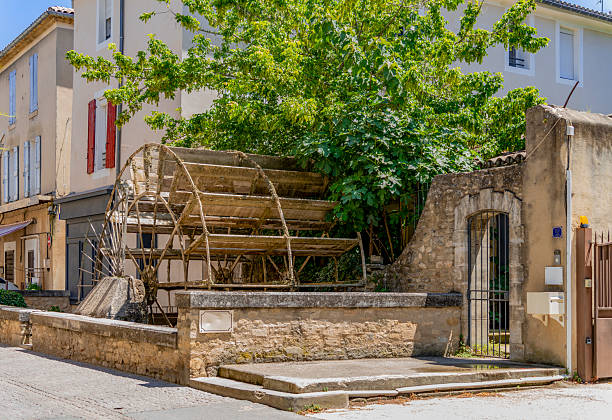 Water wheel seen in L'Isle-sur-la-Sorgue, a town and commune on the Sorgue river in Southeastern France.