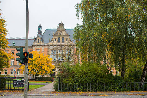 istock historic building with trees and pedestrian stoplight 2213848484