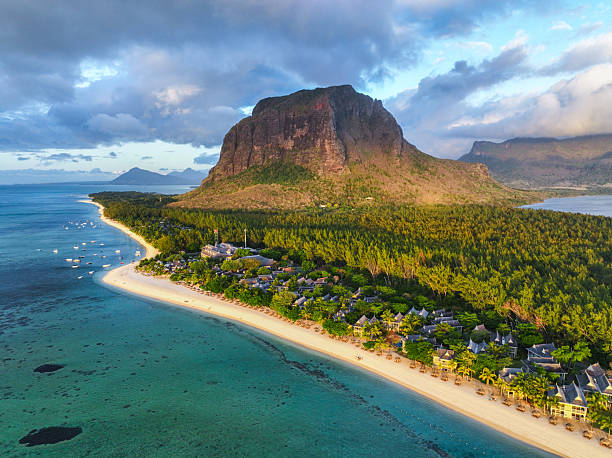 istock Peninsula shoreline at sunrise - Le Morne, Mauritius 2213849435