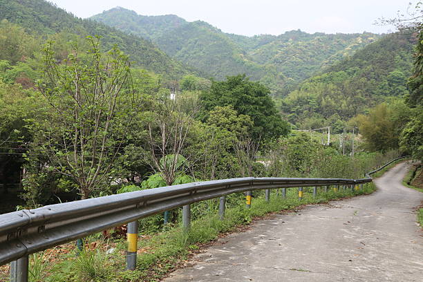 istock A road with a fence on the side 2213850126
