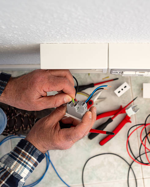 istock Electrician at work on a residential electrical system. Electricity. 2213851841