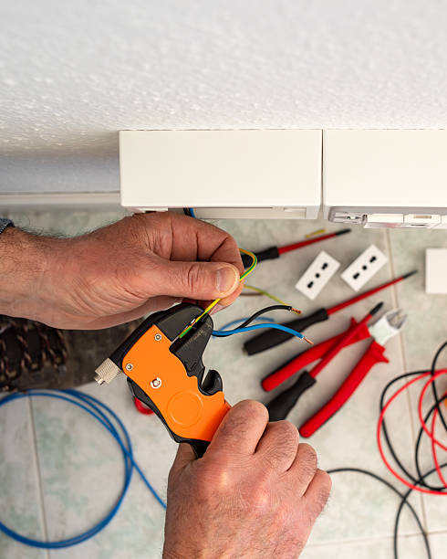 istock Electrician at work on a residential electrical system. Electricity. 2213851847