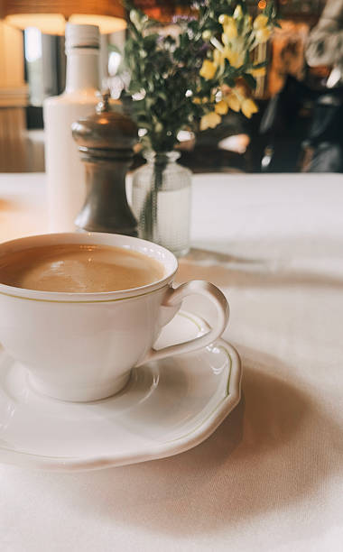 istock Cup of coffee with milk in a restaurant 2213852031