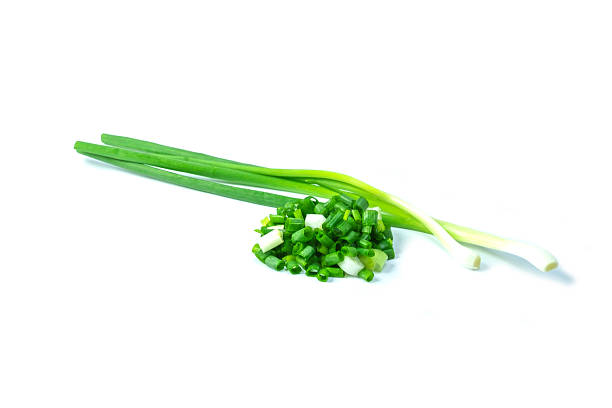 Spring Onion is immature onions with long green stalks and a small, tender white bulb, used raw as a garnish, chopped into salads, or cooked in dishes like stir-fries, adding a mild, fresh onion and garlic flavor.