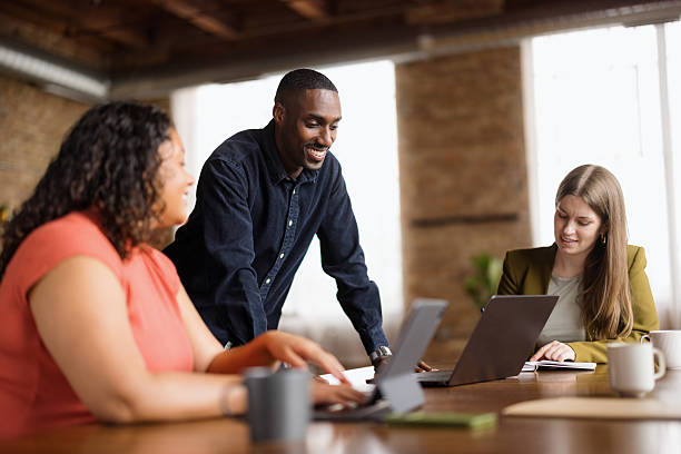 istock Happy diverse colleagues working on a meeting in the office. 2213854137