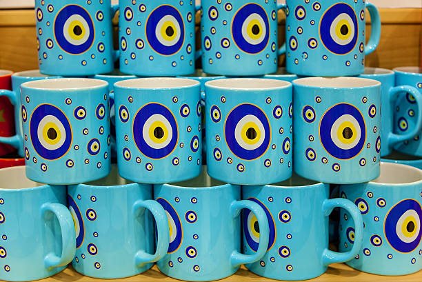 istock Colorful mugs with evil eye symbols arranged in rows 2213854824