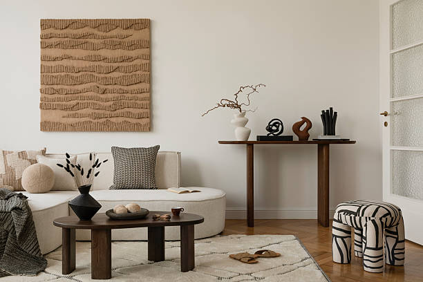 istock Minimalist living room with neutral tones, textured wall art, and modern decor elements. Cozy and stylish interior design inspiration. 2213855107