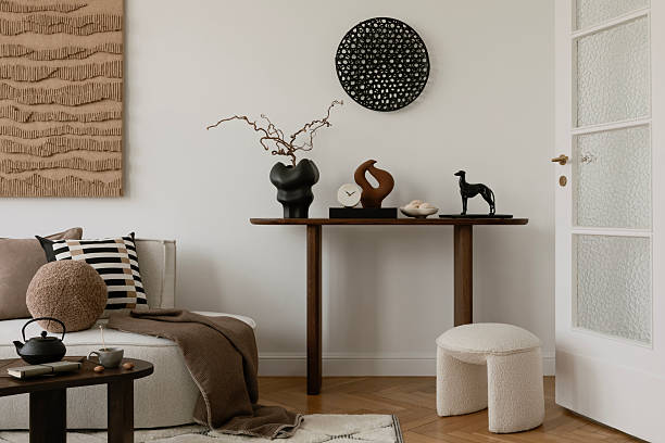 istock Elegant console table styling with artistic sculptures, ceramics, and decorative elements. A refined and curated interior vignette. 2213855120