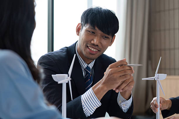 istock Sustainable ESG consultation with wind energy models and discussions 2213855655