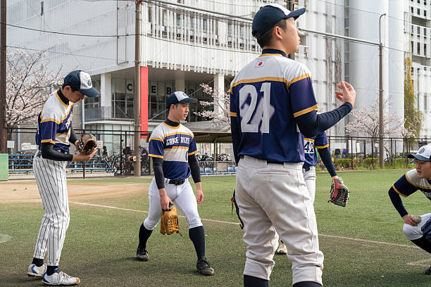 istock Young Athletes Practicing Baseball Skills on a Sunny Day in Tokyo 2213855910