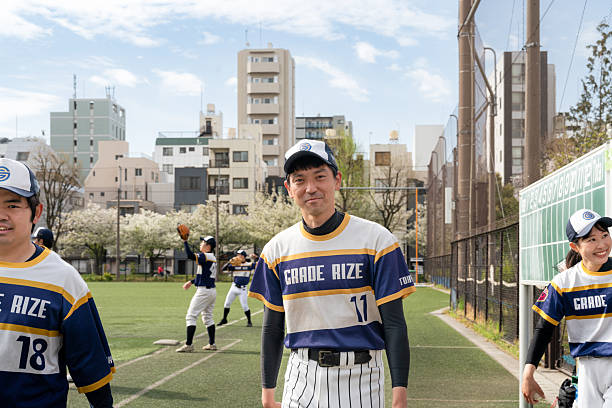 istock Local Baseball Team Practicing in an Urban Community Field Setting 2213855924