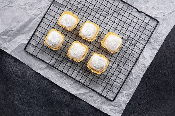 istock Delicious freshly made pastries cooling on a wire rack in a kitchen 2213856300