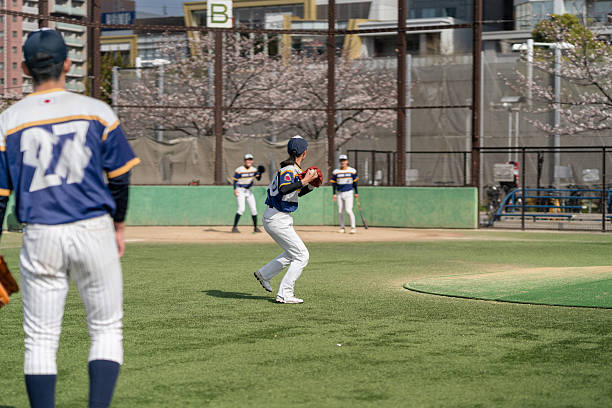 istock Local Baseball Team Practicing on a Sunny Day in Tokyo 2213856405