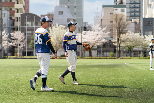 istock Local Baseball Team Enjoying Practice on a Sunny Spring Day in Tokyo 2213856622