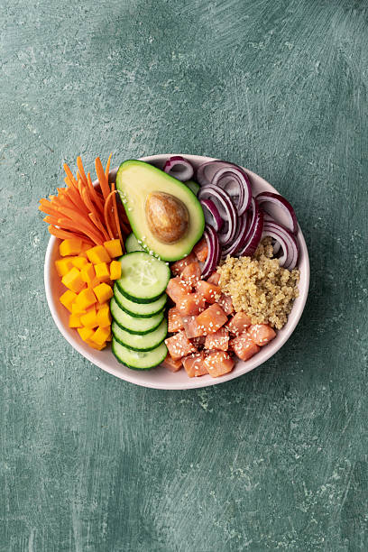 istock poke bowl salmon with quinoa and vegetables 2213858765