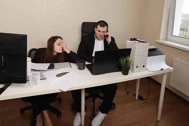 istock Coworkers Reviewing Analytics and Working Together Efficiently in Office 2213858828