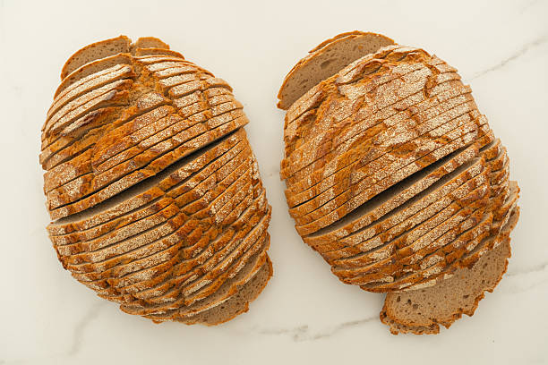 Sliced Bread Loaves on White Surface